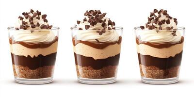 Delightful dessert cups with layers of chocolate, caramel, and whipped cream topped with chocolate shavings photo