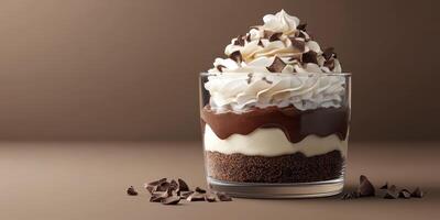 Indulgent chocolate mousse parfait layered with cream and chocolate chips on a neutral backdrop photo