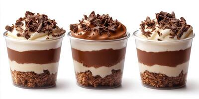 Delicious chocolate desserts served in clear cups with layers of cream and cake, perfect for any sweet tooth craving photo