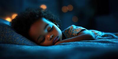 Child peacefully sleeping in soft blue light with a serene expression late at night photo