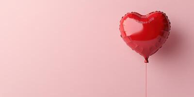 Red heart-shaped balloon floats against a pastel pink background for a romantic celebration or event photo