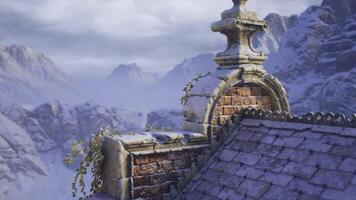 Capture of a stone structure with ivy at a snowy mountain backdrop in winter video