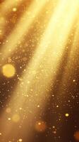 Golden light rays illuminating particles in a captivating display of beauty and sparkle during an evening event photo