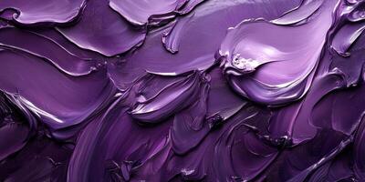 Vibrant purple oil paint texture showcasing bold brush strokes and rich color depth on canvas during artistic creation photo