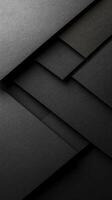 Textured layers of black paper create a modern abstract design ideal for backgrounds or art projects photo