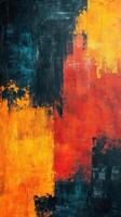 Vibrant abstract painting featuring bold colors of red, yellow, and black with textured brush strokes photo