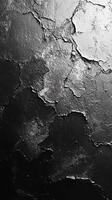 Textured black surface showcasing peeling paint and weathered details in a close-up view photo