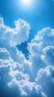 Bright sunlight filters through fluffy white clouds on a clear blue day over a serene sky landscape photo