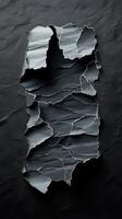 Abstract torn paper texture displayed on a dark background creates a striking visual effect appealing to designers photo