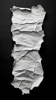 Crumpled white paper with deep texture against a black background showcasing artistic design and contrast photo