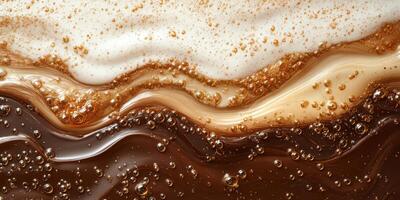 Swirls of coffee and cream create an inviting texture with bubbles and rich tones in a warm beverage photo