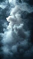 Mysterious cloud formations emerge in a dark space, creating a dramatic and captivating atmosphere photo