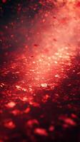 Exploring the stunning beauty of shimmering red particles illuminating a dark space with a warm glow and ethereal atmosphere photo