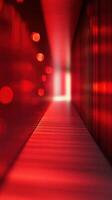 Vibrant red corridor illuminated by soft lights creates a captivating atmosphere in an abstract interior setting photo