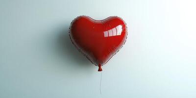 Heart-shaped red balloon floating against a pale background in a simple indoor setting photo