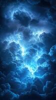 Dark storm clouds illuminated by bright lightning flashes in a night sky over a tranquil landscape photo