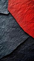 Textured black and red paper overlapping to create a striking visual contrast in a close-up view photo