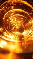 Captivating view of a swirling golden vortex showcasing mesmerizing light patterns and depth in a creative composition photo