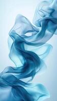 Flowing blue fabric creates a serene and elegant atmosphere in a minimalist setting photo