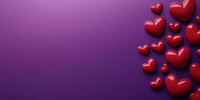 Heart decorations in various sizes on a vibrant purple background for celebration or romantic themes photo