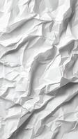 Crumpled white paper creating a textured backdrop for artistic and creative projects photo