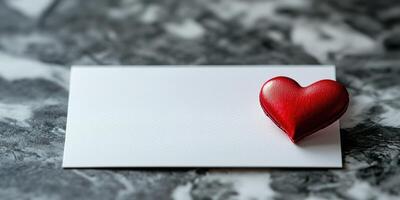 Heart-shaped decoration beside a blank card on a textured surface for creative expression and personal messages photo