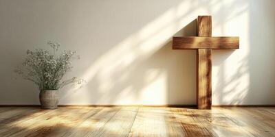 Sunlight filters through a peaceful room featuring a wooden cross and a vase of flowers on a wooden floor photo