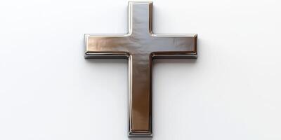 Metal cross displayed against a simple white background highlighting its reflective surface and elegant design photo