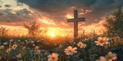 Sunset over a wooden cross in a serene meadow filled with wildflowers photo
