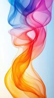 Colorful swirling smoke forming abstract patterns in fluid motion against a soft backdrop photo