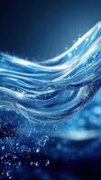 Flowing water with bubbles captured in a vibrant blue hue under soft lighting photo
