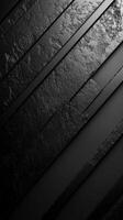 Textured black surface with angled lines creates a modern, abstract design suitable for backgrounds or art photo