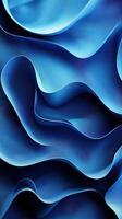 Blue fabric waves create a mesmerizing pattern and texture in an artistic display of curves and folds photo