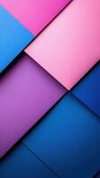 Colorful geometric paper layers arranged in a vibrant pattern showcasing shades of pink, purple, and blue photo