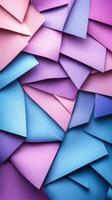 Colorful arrangement of folded paper shapes creating a dynamic pattern in shades of blue and purple photo