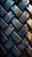 Woven metallic texture with contrasting light and shadow showcasing intricate patterns and details photo