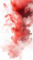 Colorful red and white powder explosion creates artistic splashes in a bright setting photo