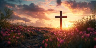 Cross stands amidst a field of flowers at sunset, creating a serene and peaceful atmosphere in the countryside photo