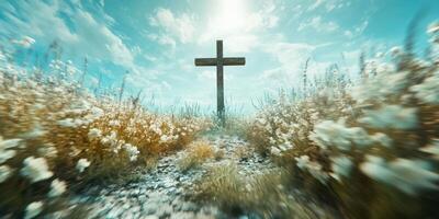 Cross stands tall in a field of blooming flowers under a bright sky during a tranquil afternoon photo