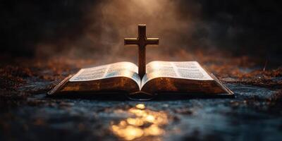 Open Bible with Cross on Top Illuminated by Soft Light in a Dim Setting photo