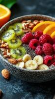 Healthy smoothie bowl with fresh fruits, nuts, and seeds on a textured surface in a cozy setting photo