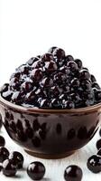 Delicious and chewy black tapioca pearls ready for desserts and drinks preparation photo