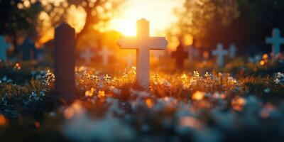 Sunset casting golden light on a graveyard adorned with crosses and blooming flowers during a tranquil evening photo
