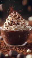 Decadent chocolate dessert topped with whipped cream and chocolate shavings at a cozy cafe photo