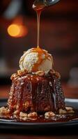 Delicious dessert with ice cream and caramel sauce served on a plate in a cozy setting photo