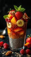 Delicious fruit parfait with chia seeds and nuts served in a clear glass for a healthy dessert option photo