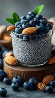 Healthy dessert featuring chia seed pudding topped with fresh blueberries and almonds in a rustic setting photo