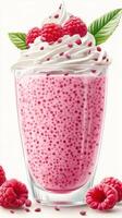 Refreshing raspberry dessert topped with whipped cream and garnished with fresh leaves photo