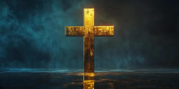 Golden cross illuminated by soft light against a dark background during a serene moment of reflection photo