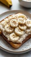 Delicious toasted bread topped with banana slices and chia seeds for a healthy breakfast treat photo